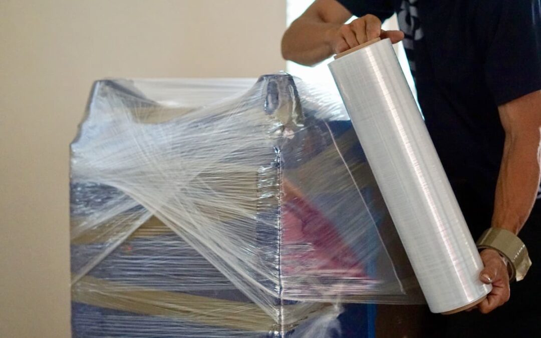 furniture being wrapped in plastic